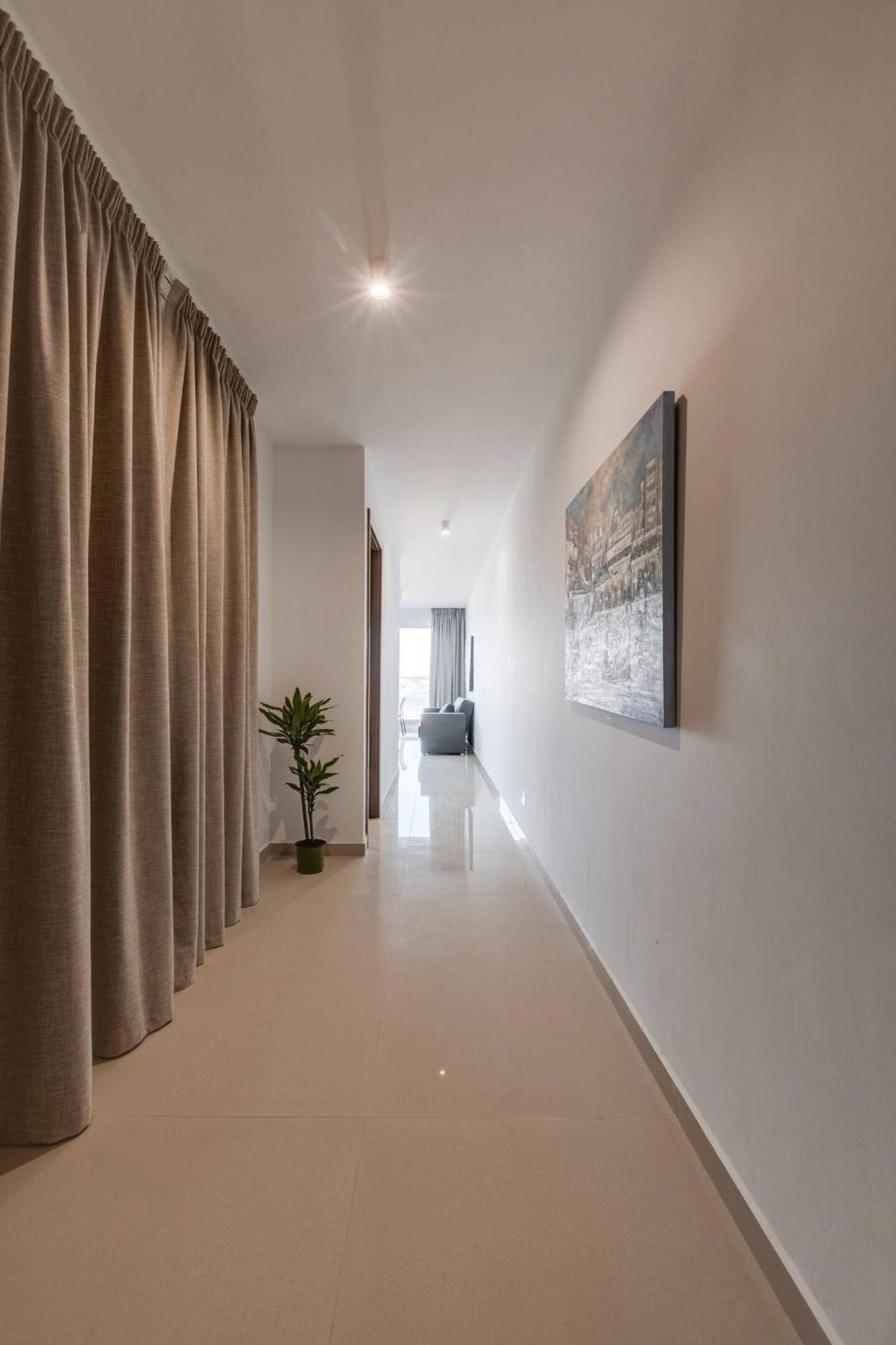 9Ten11 Seafront By Homely Mellieha Bagian luar foto